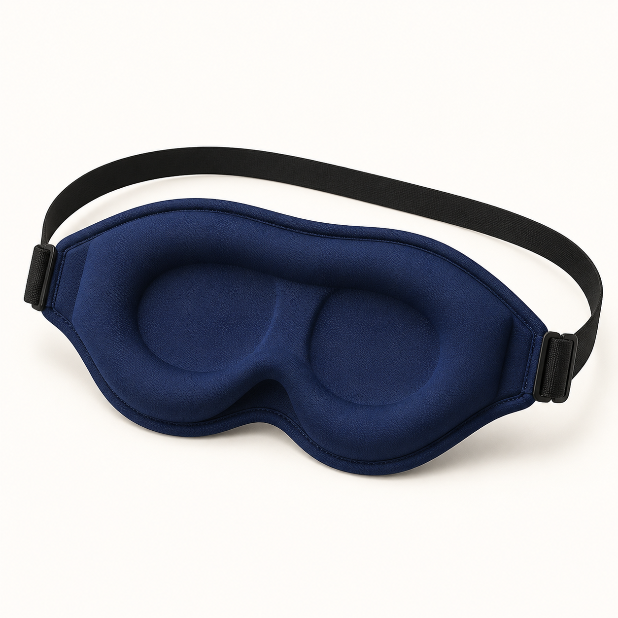 Emberly Weighted Sleep Mask in navy blue with a black strap